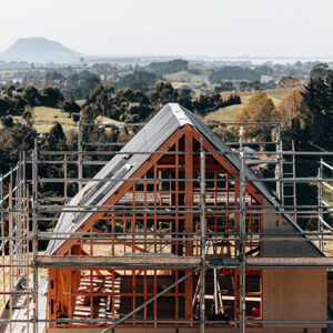 Drone view of a house scaffolding in New Zealand